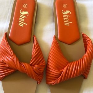 Sheln Women's Bold Orange Twist Sandals
